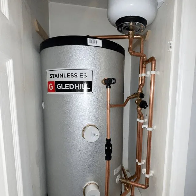 A hot water cylinder and boiler with new copper pipework