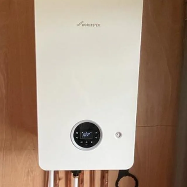 A newly installed wall mounted combi boiler